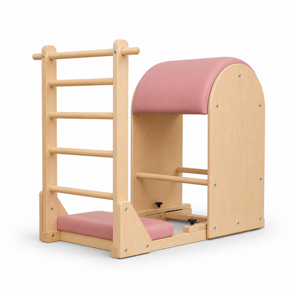 REFORMIA Pilates Ladder Barrel in solid maple with Vintage Pink upholstery, three-quarter studio view